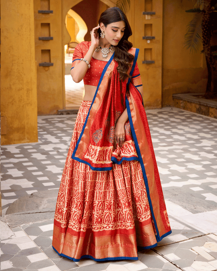 Rust Orange Color Ethnic Batik Printed Lehenga Set