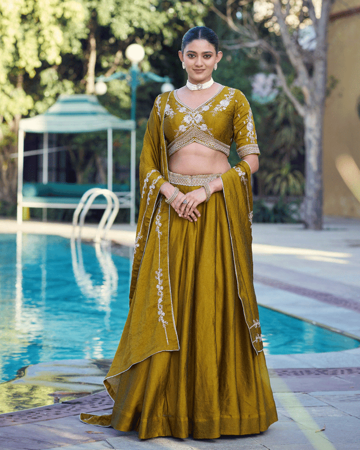 Embellished Mustard Color Rangoli Crush Lehenga Choli