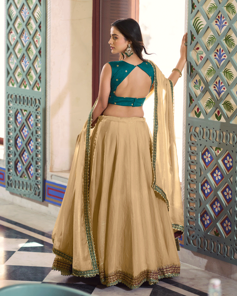 Champagne Beige Lehenga With Green Embroidered Choli Set