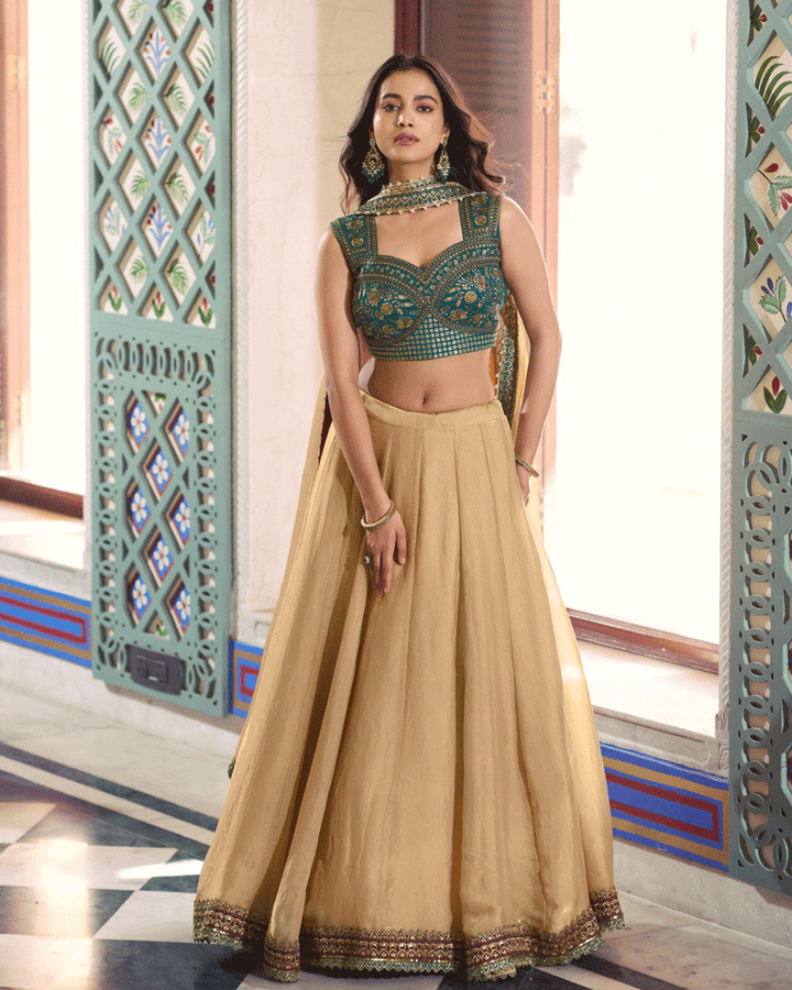 Champagne Beige Lehenga With Green Embroidered Choli Set