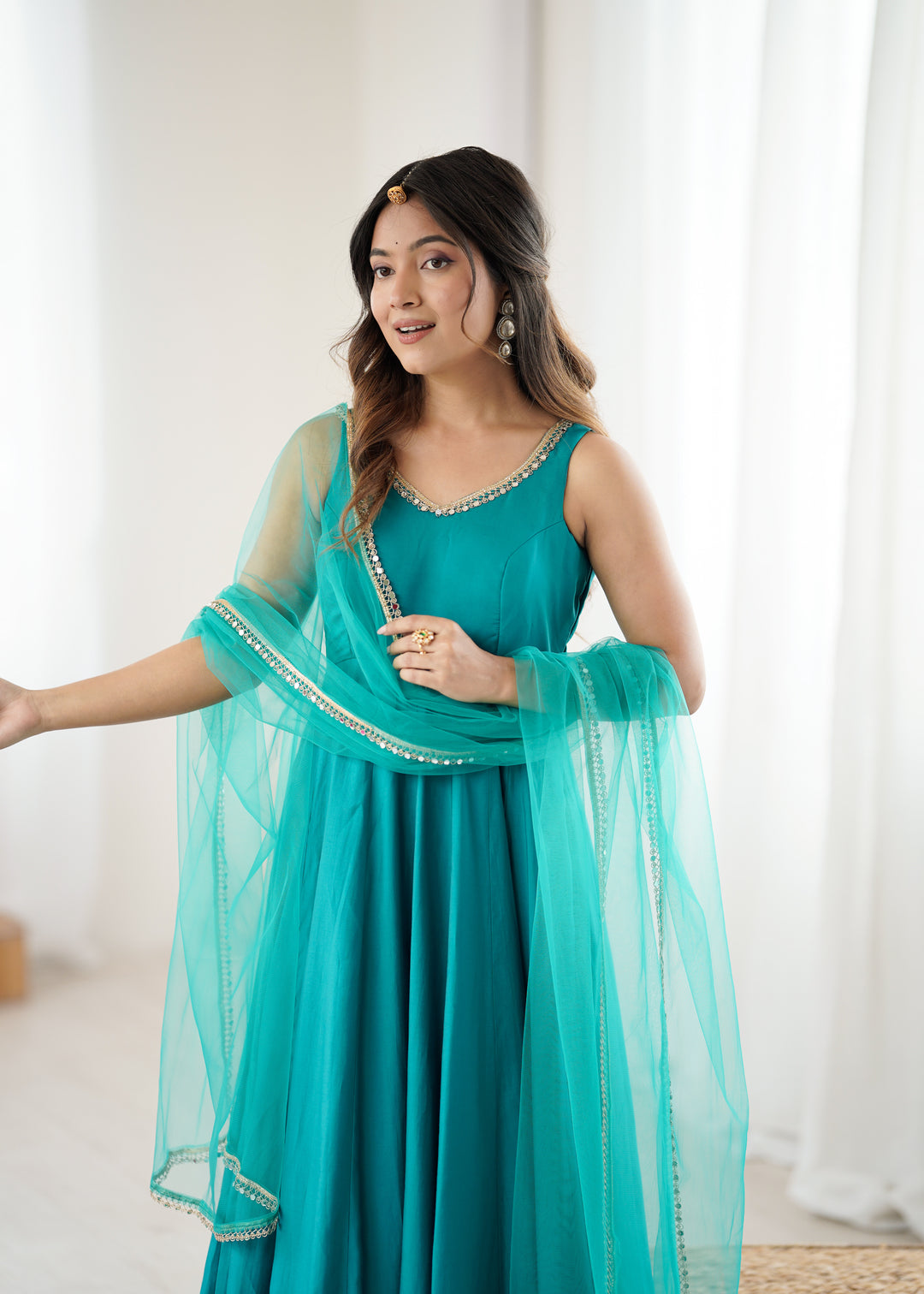 Peacock Teal Sleeveless Roman Silk Chanderi Flared Anarkali Suit