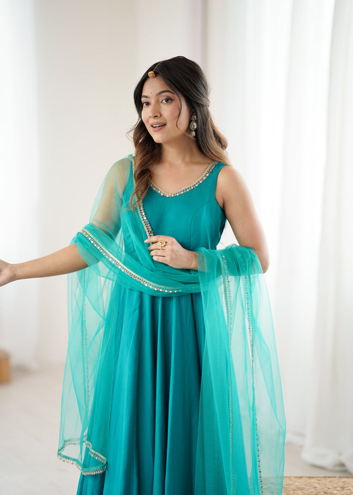 Peacock Teal Sleeveless Roman Silk Chanderi Flared Anarkali Suit